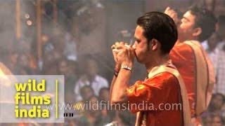 Priests blow conch shell Shankh before Ganga aarti at Banaras [upl. by Yentyrb]