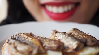 Girl eats Sprats tiny fishes with Bread Mouth close up Chewed food warning [upl. by Fretwell558]