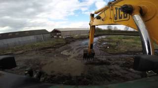 Jcb Js 130 cleaning slurry lagoon [upl. by Angel]