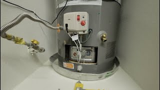 How To Relight Flame amp Reset Gas Pilot Light on Electric RHEEM Performance Platinum Water Heater [upl. by Fillian680]