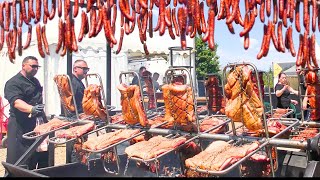 Bucharest Street Food Roasting Ribs Romanian Style Sausages Pork Knuckles amp more [upl. by Ahsinik]