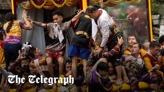 Millions of Filipinos swarm statue of Jesus for Black Nazarene procession [upl. by Leimaj720]