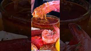 Eating A Giant King Crab Leg in Seafood Boil Sauce [upl. by Enilreug]