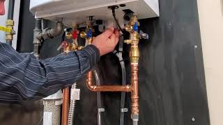 Basic Maintenance of a Navien NPE A tankless water heater [upl. by Rudman]