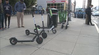 Dockless bike shares and scooters litter city streets [upl. by Onej]