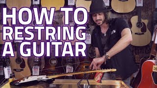 How To Restring Your Guitar  A guide to restringing Acoustic amp Electric guitars [upl. by Callida]