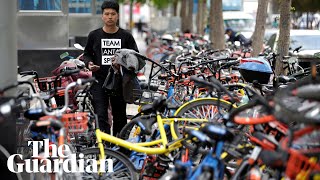 Peak bike are Chinas dockless cycles becoming a public nuisance [upl. by Masha]