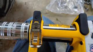 Loading a Dewalt Battery powered Grease gun [upl. by Anihs]