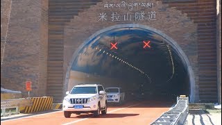 Worlds Highest Highway Tunnel Opens to Traffic in Chinas Tibet [upl. by Bathulda487]