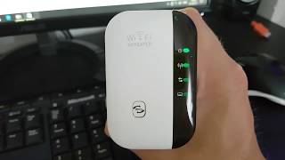 Wifi Repeater 300Mbps Signal Extender Booster Review Setup [upl. by Alimak]