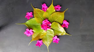 How to make easy rangoli with leaves and flowers  Diwali Rangoli designs  Rangoli with Leaves [upl. by Retxed]