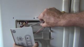 How to repair a frozen GE Refrigerator water dispenser [upl. by Ynner]