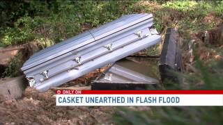 Casket unearthed in flash flood [upl. by Geesey]