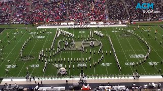 US marching band surprises crowd with Bluey theme song [upl. by Enehpets245]