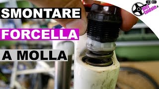 COME FARE LA MANUTENZIONE ALLA FORCELLA A MOLLA DELLA MTB [upl. by Hooge11]