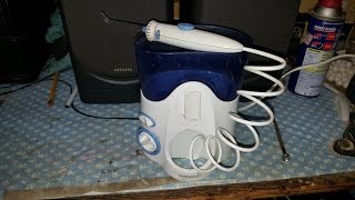 Waterpik flosser not pumping water with dissassembly instructions [upl. by Yartnod405]