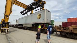 Freight Car Unloader On Its Own Track Unloads Trailer From Railroad Car How RR Cars Are Unloaded [upl. by Franklyn770]