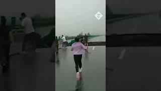 Moment cars fall into void left by a collapsed bridge near Beijing amid massive flooding [upl. by Aerdnac949]