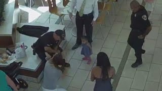 Surveillance video shows 2 officers saving choking baby [upl. by Souvaine]