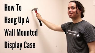 How To Hang Up A Wall Mounted Display Case [upl. by Ebby756]