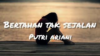 Putri Ariani  bertahan tak sejalan lirik [upl. by Loredo]