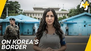 North Koreas dangerous border Inside the DMZ Pt1  AJ [upl. by Portingale]