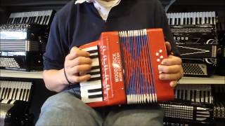 WDTOYPA8R  Red Woodstock Toy Piano Accordion M 17 8 40 [upl. by Atinaj]