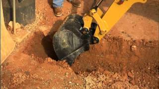 Cat® Backhoe Tool Attachment at Work [upl. by Ransom425]