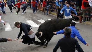 Top 10 Funny  Spain Bull Running On Street beating people 😂😂 [upl. by Ennael541]