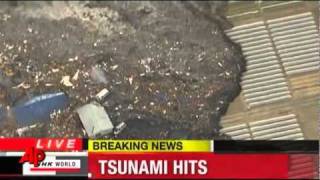 unnaturally moving object At the crest of the tsunami wave Japan 11 03 2011flv [upl. by Bred596]