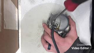 How to clean the carburetor on a kids ATV [upl. by Borden]