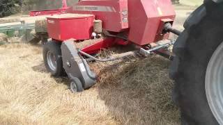 Massey Ferguson 1840 baling hay [upl. by Florida]