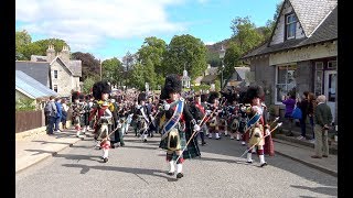 Braemar Gathering 2017  Massed Pipe Bands Bands Parade through village to the highland games in 4K [upl. by Wilkison607]