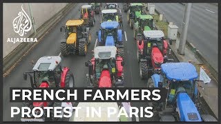 Protesting French farmers roll out up to 1000 tractors in Paris [upl. by Ecurb]