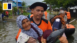 Dozens die in Indonesian floods and landslides [upl. by Norga213]