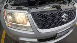 How to Replace Headlight Bulbs in Suzuki Grand Vitara [upl. by Notgnirrab950]