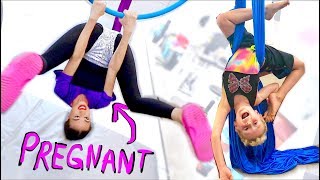 PREGNANT LADY DOES ACROBATS WITH CHILD [upl. by Luhem889]