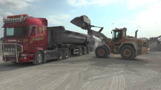 Scania truck is loaded by a Volvo L120G wheel loader 2013 [upl. by Fulbert578]