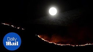 Huge blaze continues to spread across Saddleworth Moor [upl. by Aitercul]