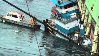 Tug Boat becomes pinned under Bridge [upl. by Guyer]