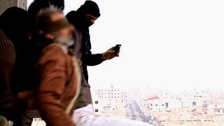 ISIS throws gay men off buildings [upl. by Caren]