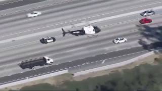 Police chase armed robbery suspect through LA streets freeways [upl. by Ri]