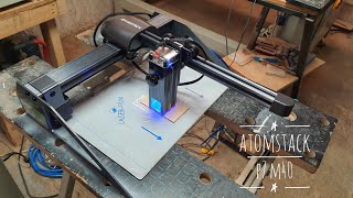 Atomstack P7 M40 portable laser engraver  unboxing assembly and test [upl. by Ahtanoj]