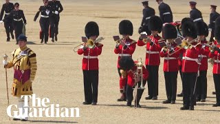 Soldier faints during trooping the colour rehearsal in London heatwave [upl. by Retniw]