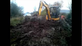 JCB Mini Digger Backfilling Trench Part 1 [upl. by Rebeca615]