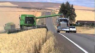 John Deere Combine Unloading On Go  Highway [upl. by Esilehs566]