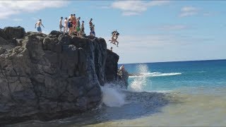 People Jumping from the Rock at Waimea Bay Oahu [upl. by Gaye592]