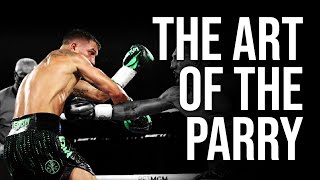 Learn the UNCOMMON WAYS to parry punches in boxing [upl. by Ware]