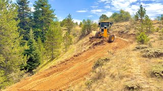 How to Widen a Road and Open a Flooded Road with a John Deere 670 GP Grader grader [upl. by Verneuil]