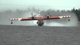 CL415 Canadair or Bombardier Water Bomber pick up and water drop [upl. by Znerol818]